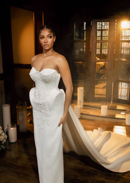 Gali custom strapless corset wedding dress in white with embroidered bodice and train by House of Kenneth Tetteh